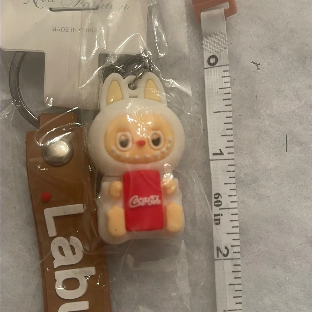 Brown Labubu Keychain with Cute Character holding soda nwt
